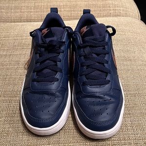 Nike Little Boys Size 6Y. Navy Leather  & Rose Gold swoosh. Great condition.